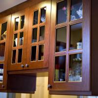 Center island upper cabinets with glass doors