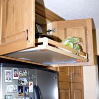 Roll-out above refrigerator